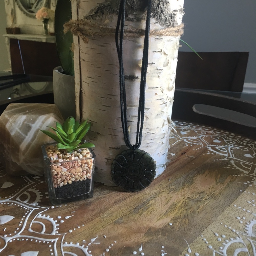 2 leather rope necklaces with pretty pendants
